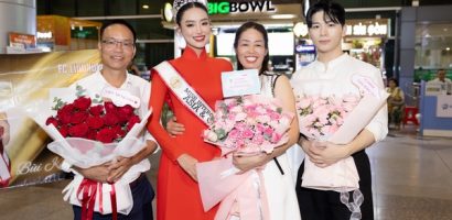 Bùi Khánh Linh diện áo dài, đội vương miện Á hậu quốc tế trở về nước