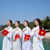Thí sinh Miss Cosmo Vietnam khoe sắc với áo dài giữa biển trời Nha Trang