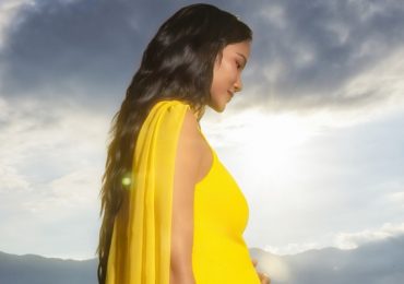H’Hen Niê diện đầm vàng khoe bụng bầu trong MV mới
